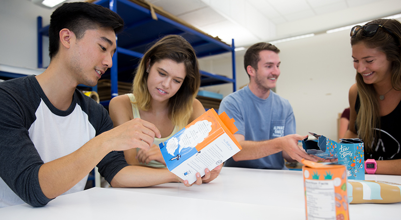 Students at California Polytechnic State University (Cal-Poly) work on a packaging prototype in 2022. Cal-Poly is one of nine schools that is part of the Packaging Program Council.